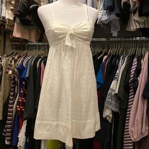 Adjustable white eyelet dress cotton material